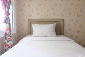 Simply 1BR Apartment at Parahyangan Residence By Travelio